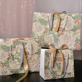 1 шт. Переносная сумка с бумажным цветочным принтом, узор из роз шампанского, сумки для подарков с лентами, свадебные, помолвочные, подарочные пакеты для вечеринок.